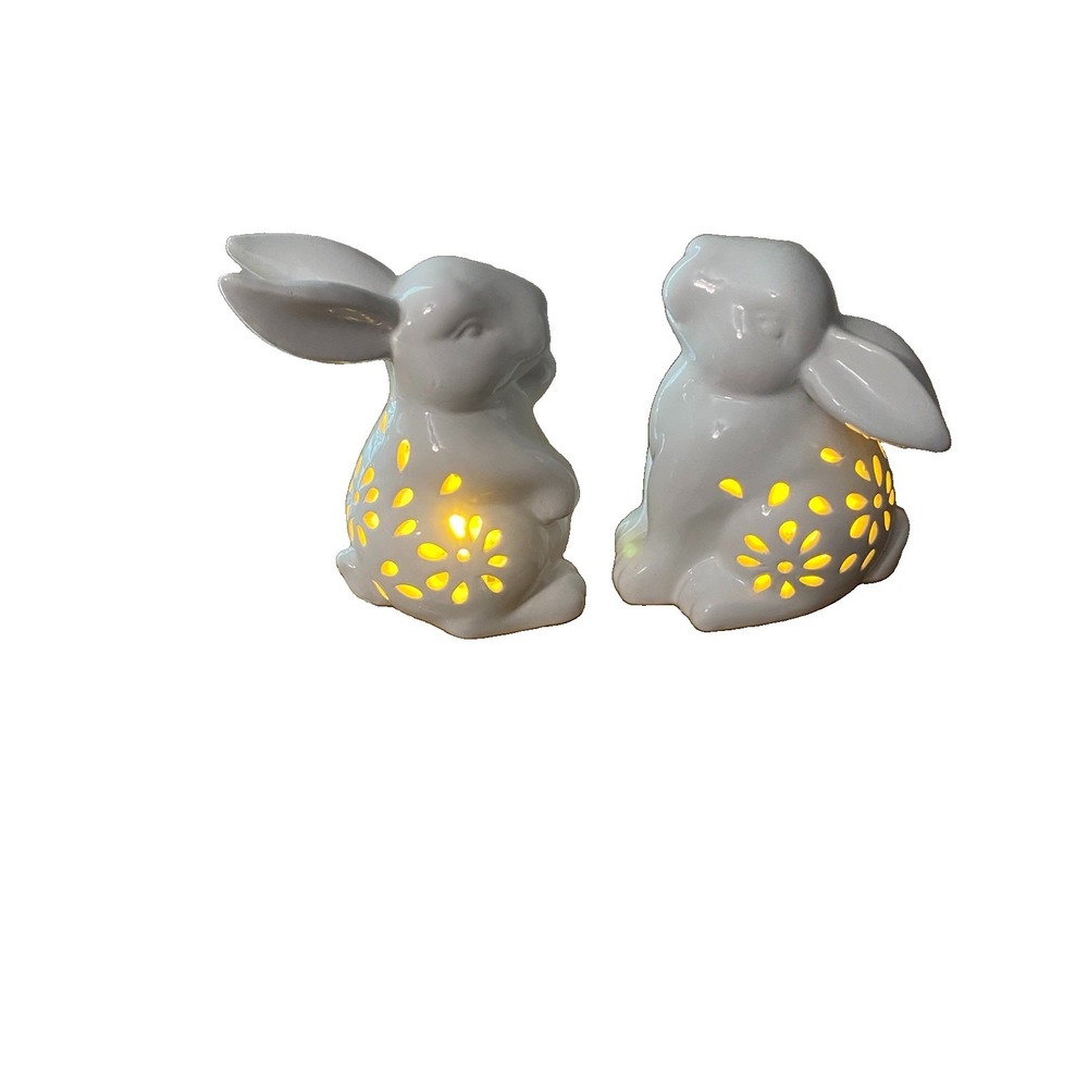 White Ceramic Rabbits Animal Figurine with Cutout Floral Pattern. Lighted.